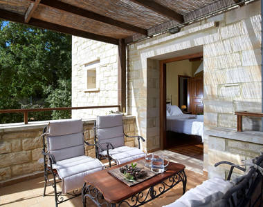 Vederi Estate Villa Kyveli balcony with table, chairs and bedroom view