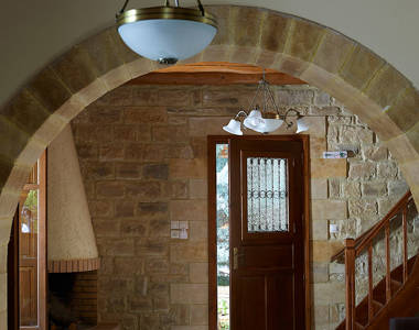 Vederi Estate Villa Alkioni living room with fireplace